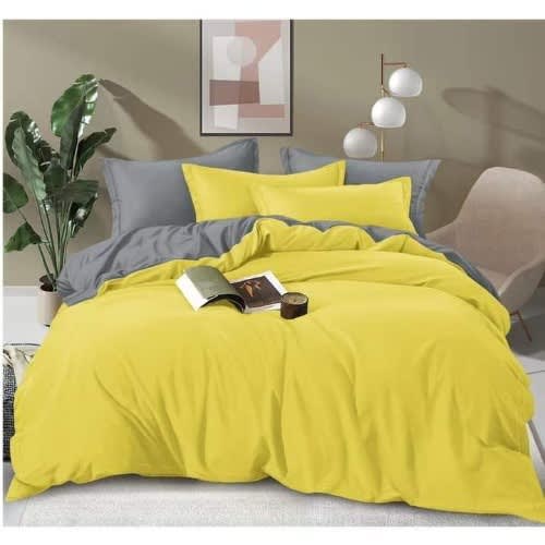 A Duvet Cover With Duvet And Four Pillowcases