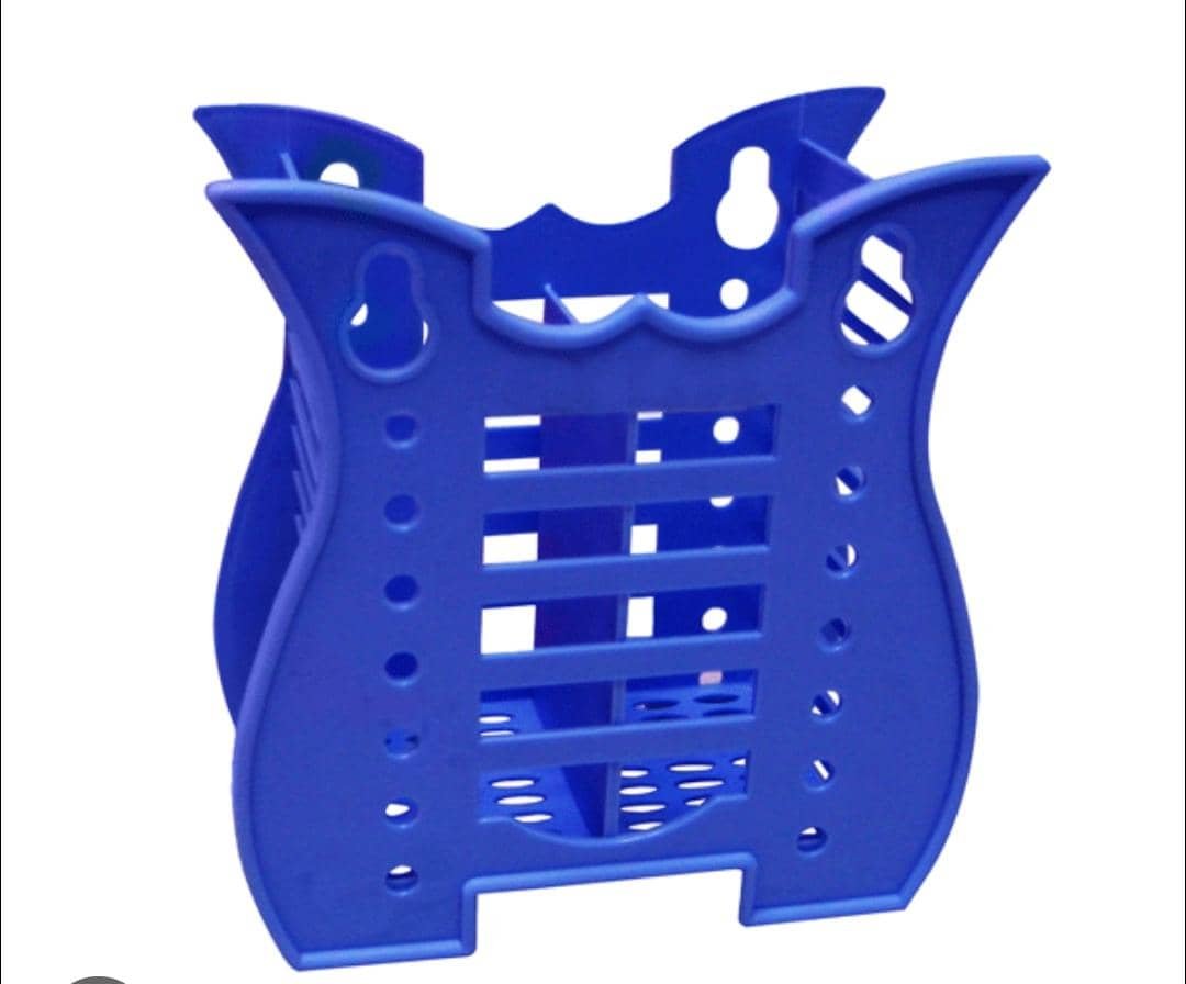 Blue plastic tooth brush holder