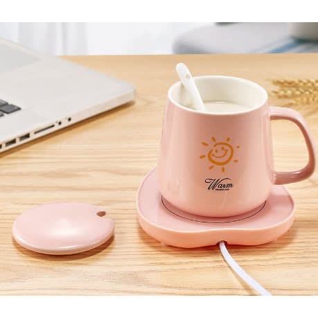 Coffee Cup With Saucer, Spoon And A Warmer.